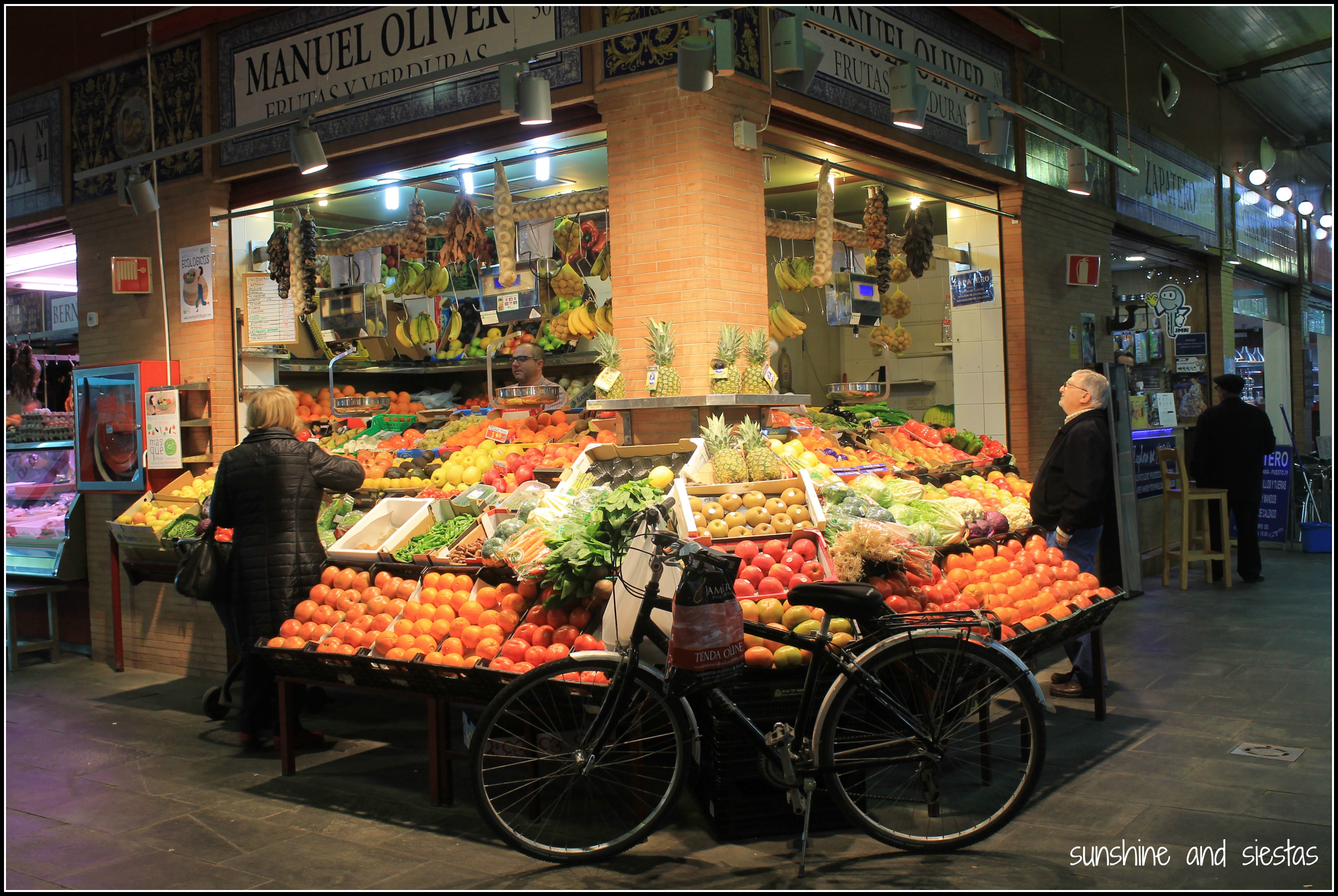 Fruit stands at the Mercado de Triana food market